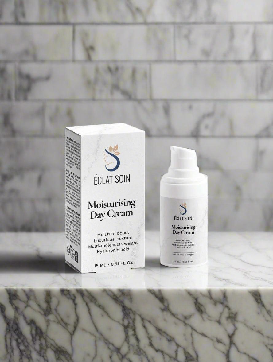 Eclat Soin Multi-Molecular-Weight Hyaluronic Acid Moisturising Day Cream in elegant packaging on marble surface